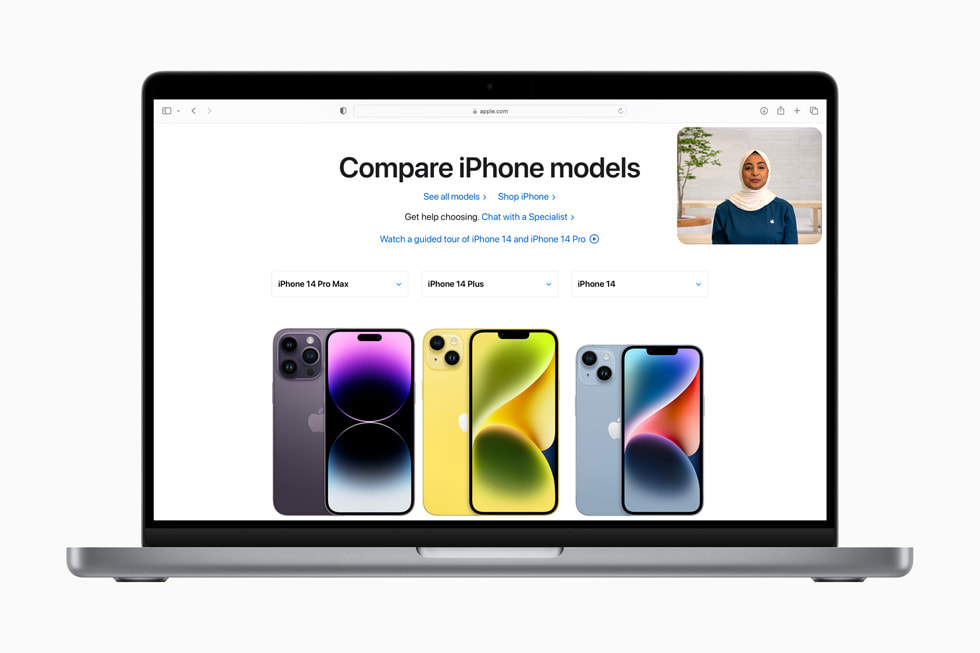 The Shop with a Specialist over Video experience is shown over an [apple.com] (https://www.apple.com) page reading “Compare iPhone models” and showing iPhone 14 Pro Max, iPhone 14 Plus, and iPhone 14.