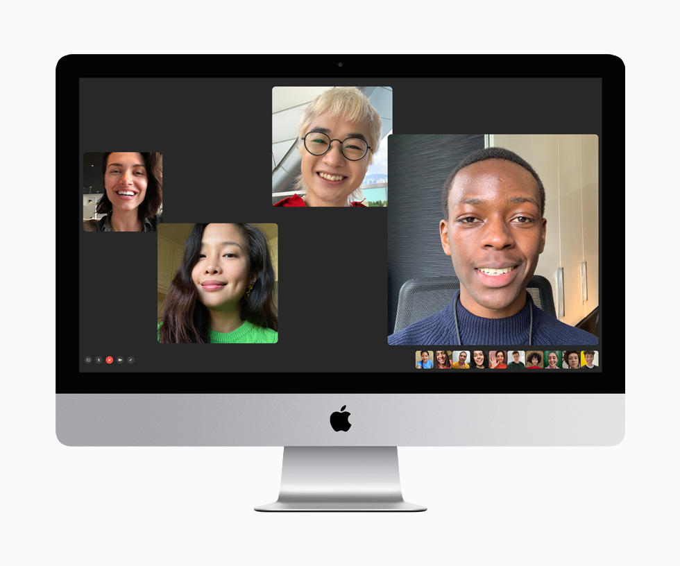 Vierzehn Personen verbinden sich über FaceTime auf dem 27" iMac.