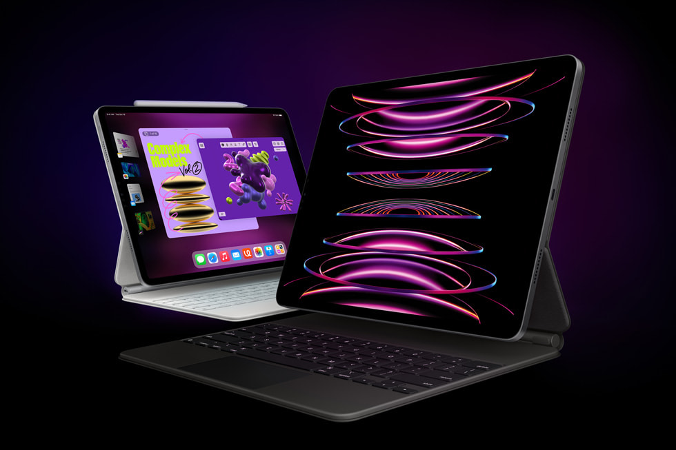 iPad Pro prateado com Magic Keyboard branco e Apple Pencil e iPad Pro cinza-espacial com Magic Keyboard preto.