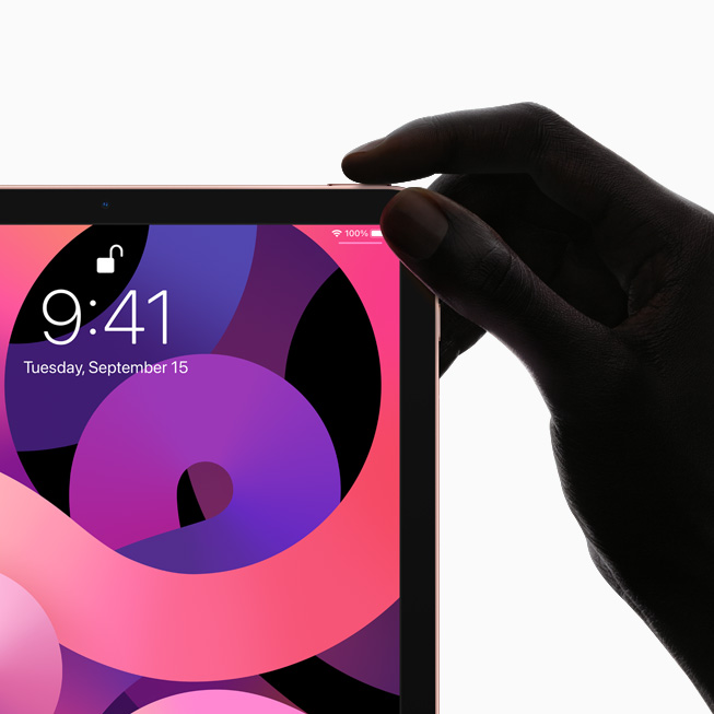 iPad Air sedd framifrån, med heltäckande skärm och övre knapp med Touch ID-sensor