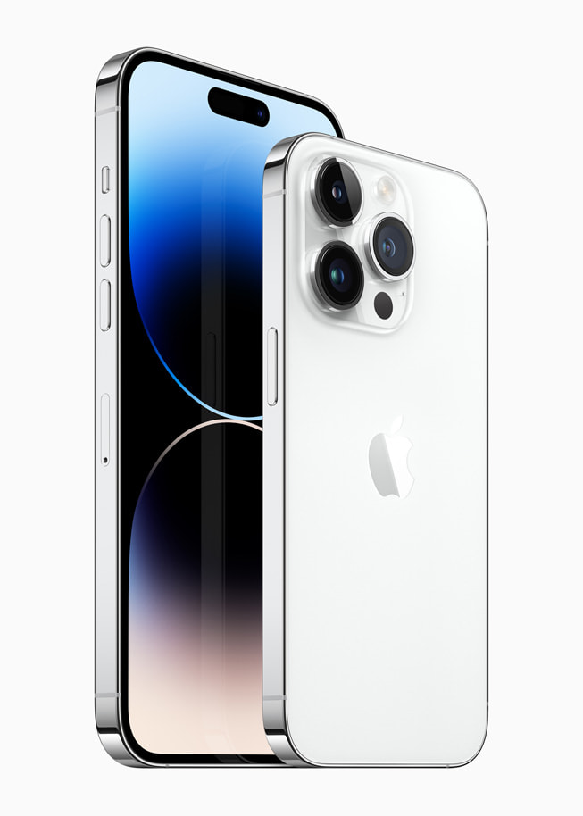 Ilustracja przedstawia iPhone’a 14 Pro i iPhone’a 14 Pro Max w kolorze srebrnym.