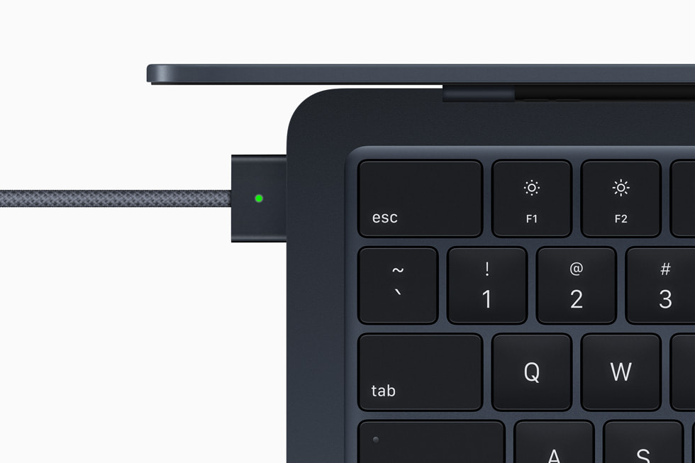 The MagSafe charging port is shown in detail on the new MacBook Air.