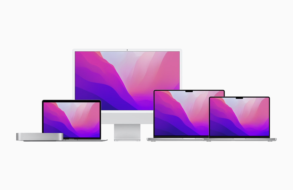Vier Mac-schermen en de nieuwe Apple chips.