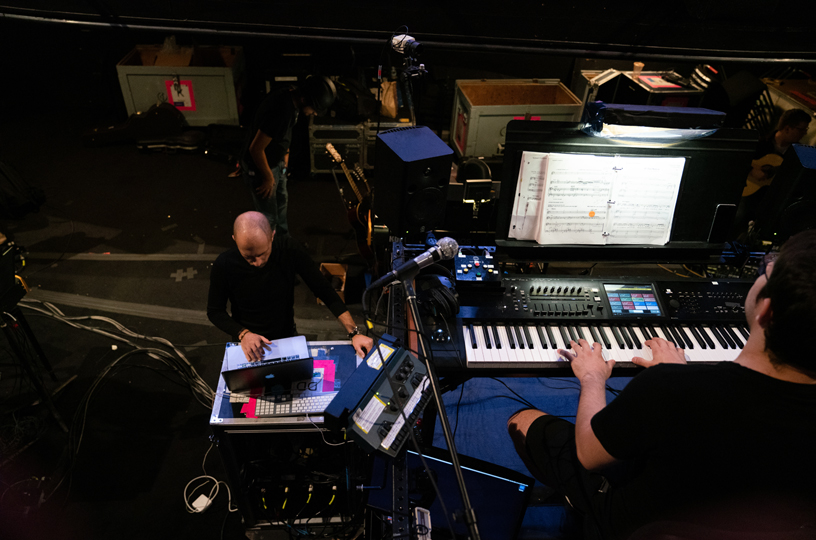 De Trizio using a MacBook Pro and the conductor testing out instruments.