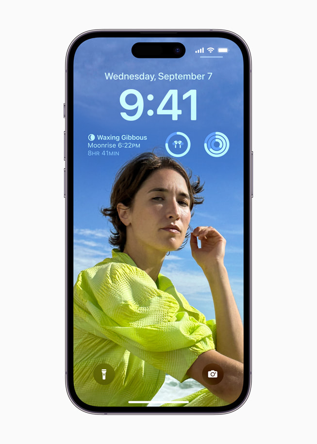 iOS 16’s personalized Lock Screen with widgets on iPhone 14 Pro.