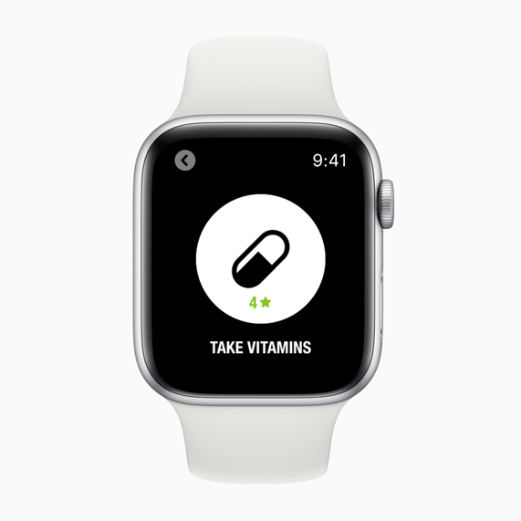 Apple Watch displaying “take vitamins” reminder.