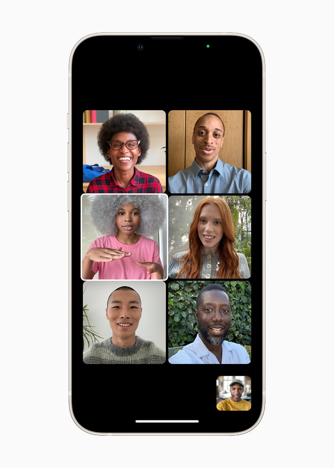 iOS 15's Group FaceTime displaying participants in same-size tiles in a grid view on iPhone.