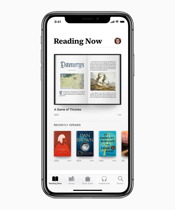 iPhone X showing Reading Now screen in the Apple Books app.