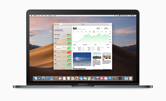 Stocks app on MacBook Pro desktop.