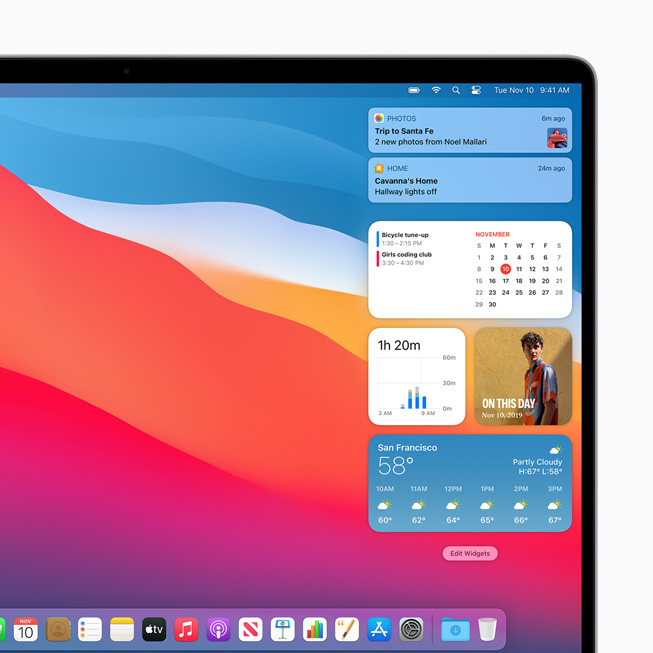 Обновлённые виджеты на экране MacBook Pro.