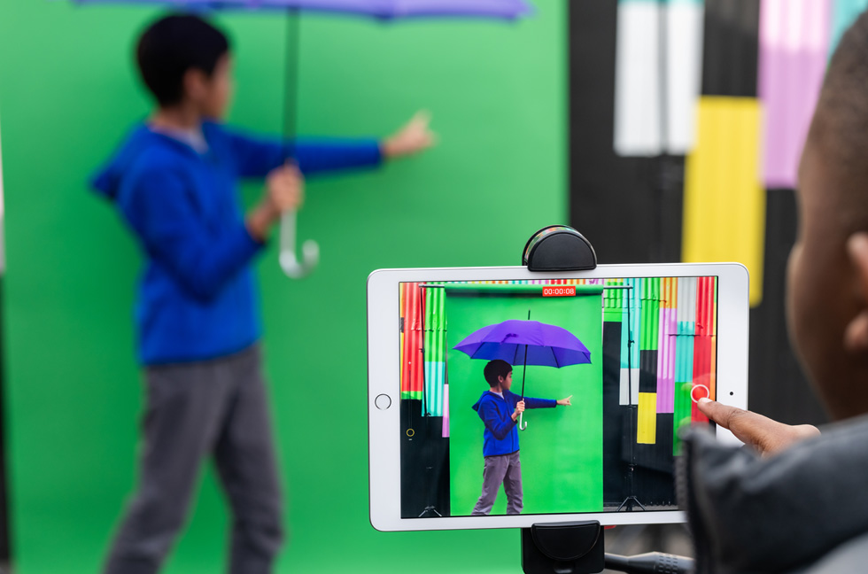 Students experiment with green-screen effects using the Everyone Can Create curriculum on iPad.