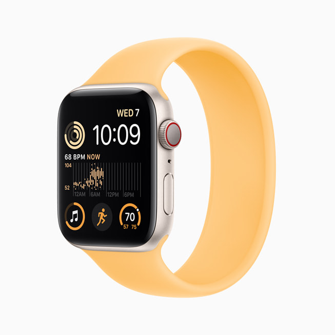 Nya Apple Watch SE med aluminiumboett i stjärnglans. 