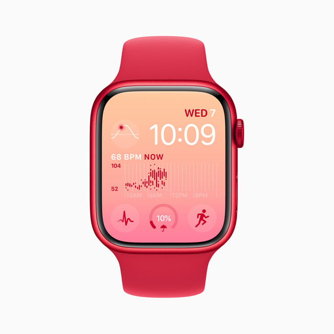 Eine Apple Watch Series 8 mit Modular Zifferblatt mit rosa und roter Hintergrundfarbe. 