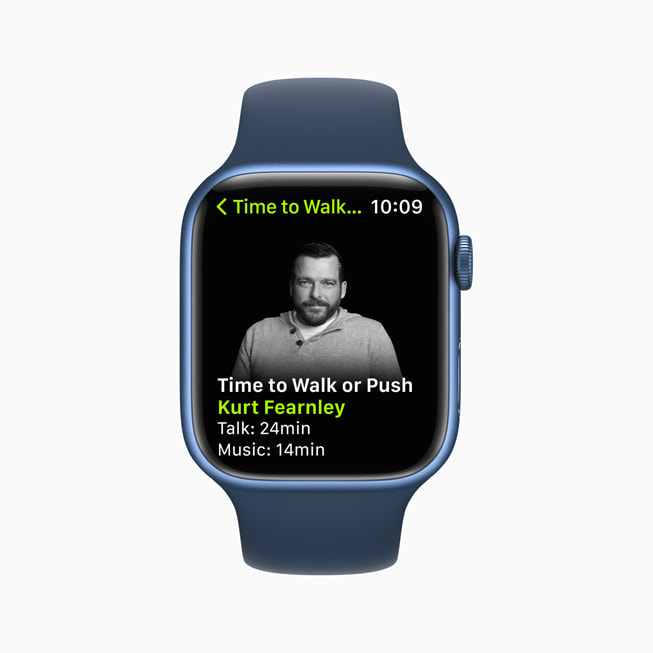 An Apple Watch screen shows a Time to Walk or Push workout in Apple Fitness+.