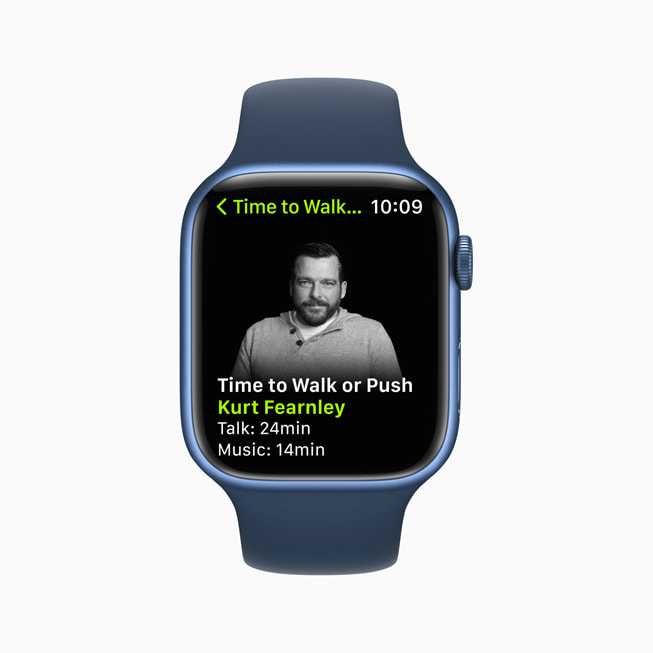 An Apple Watch screen shows a Time to Walk or Push workout in Apple Fitness+.