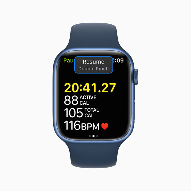 An Apple Watch screen shows the double-pinch gesture a user can use to resume a workout.