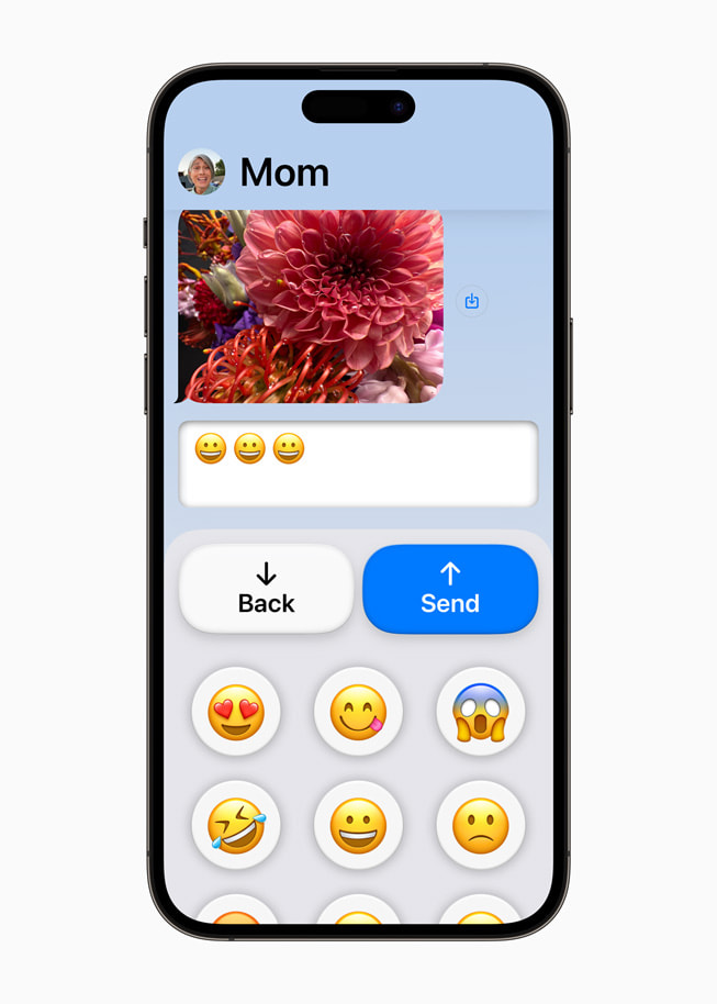 L’app Messages simplifiée avec un clavier d’emoji sur un iPhone 14 Pro Max.