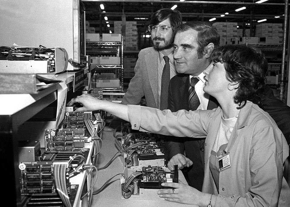 Steve Jobs and others visit Apple's Cork, Ireland, campus in the 1980s.