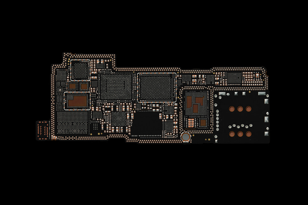Main logic boards from Apple devices are shown.