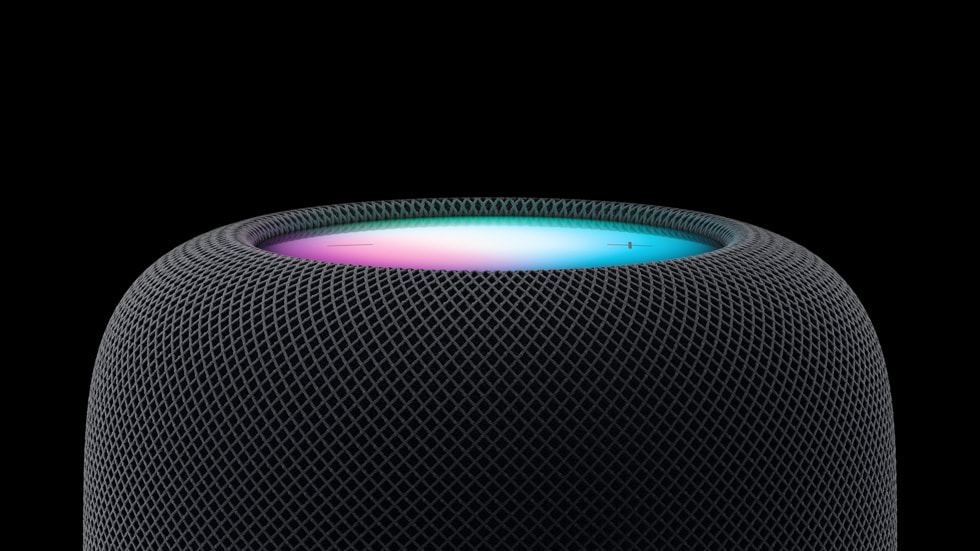 Close-up van een HomePod in middernacht.