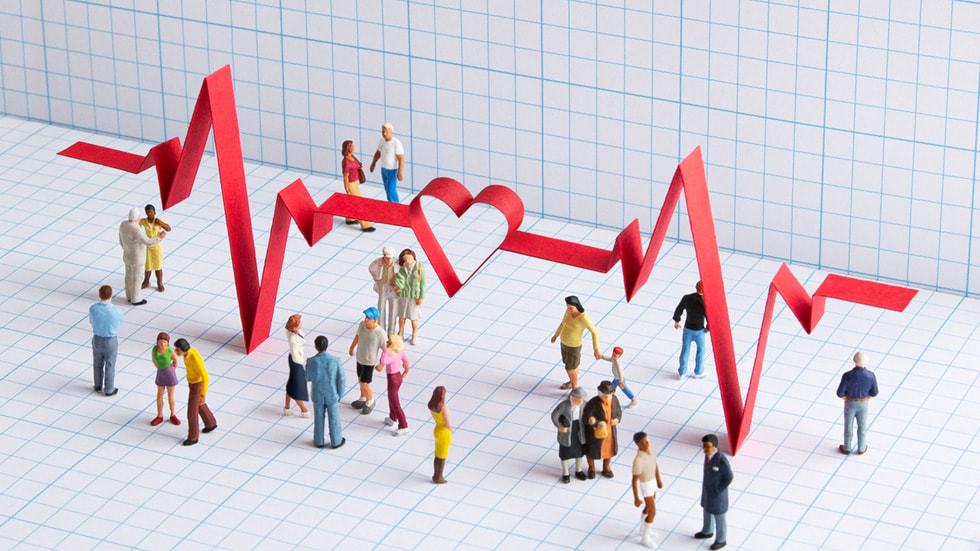 Illustration von Menschen, umgeben von einer großen EKG-Grafik. 
 