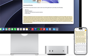 Mac mini frontal, așezat sub Studio Display, un iPhone se află în dreapta dispozitivului și a ecranului, textul selectat cu comenzile tăiere, copiere, lipire și Auto-completare afișate deasupra pe iPhone corespunde textului evidențiat de pe ecran, prezentând Clipboard universal