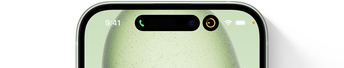 iPhone 15 zobrazujúci Dynamic Island rozdelený na dve bubliny.