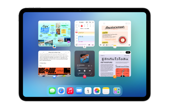 iPad ในแนวนอน แสดง 6 หน้าต่างเปิดอยู่ใน 2 แถว รวมถึงแอปปฏิทิน, โน้ต, Apple Music และ Safari