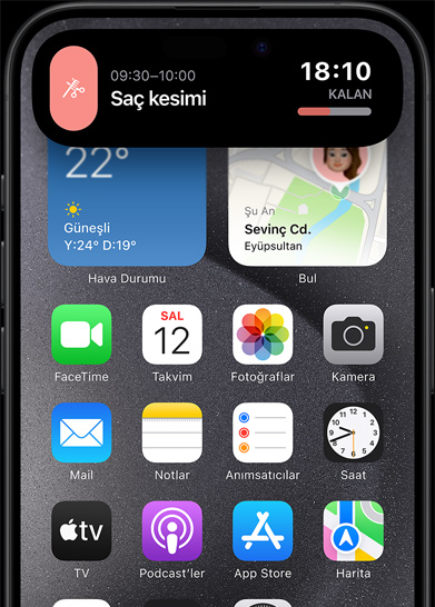 iPhone 15 Pro’daki Dynamic Island özelliğinde saç kesimi randevusu anımsatıcısı gösteriliyor