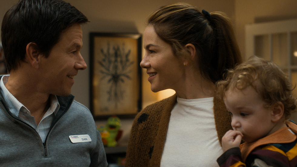 Mark Wahlberg and Michelle Monaghan in “The Family Plan,” premiering December 15, 2023 on Apple TV+.