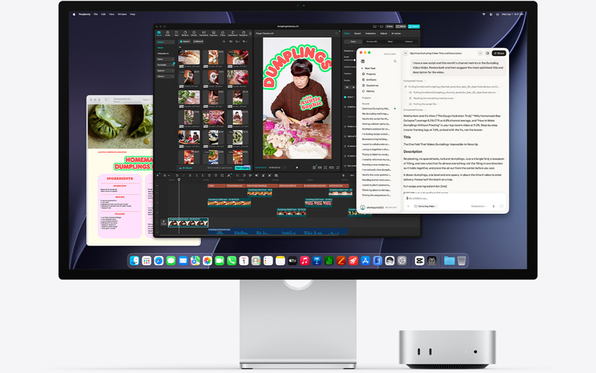 Mac mini front, tucked under Studio Display, screen shows Perplexity Personal Computer, CapCut, and Pages running in macOS environment
