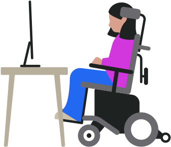 Pessoa em uma cadeira de rodas motorizada olha para o computador Mac que está sobre a mesa