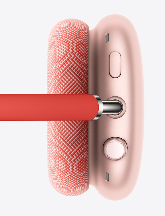 Bild der Digital Crown und Tasten zur Lautstärkeregelung an der rechten Hörmuschel in Pink.
