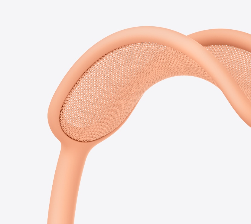Un paio di cuffie AirPods Max 2 arancioni, dettaglio dell’archetto in tessuto traforato