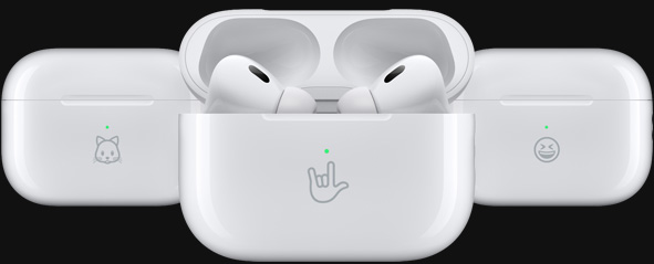 Three MagSafe Charging Cases are engraved with example emojis: a kitten, an I‑love‑you hand sign and a smiley face.