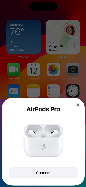 iPhone 옆에 AirPods Pro를 보유하는 Magsafe 충전 케이스. iPhone 홈 화면의 작은 타일은 탭하면 AirPod를 쉽게 결합하는 Connect 버튼으로 팝업을 표시합니다