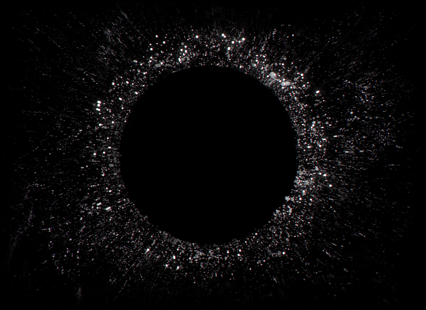 En animasjon av høyre øretelefon er plassert i sentrum av en ring av små lydpartikler som sprer seg ut fra senteret.