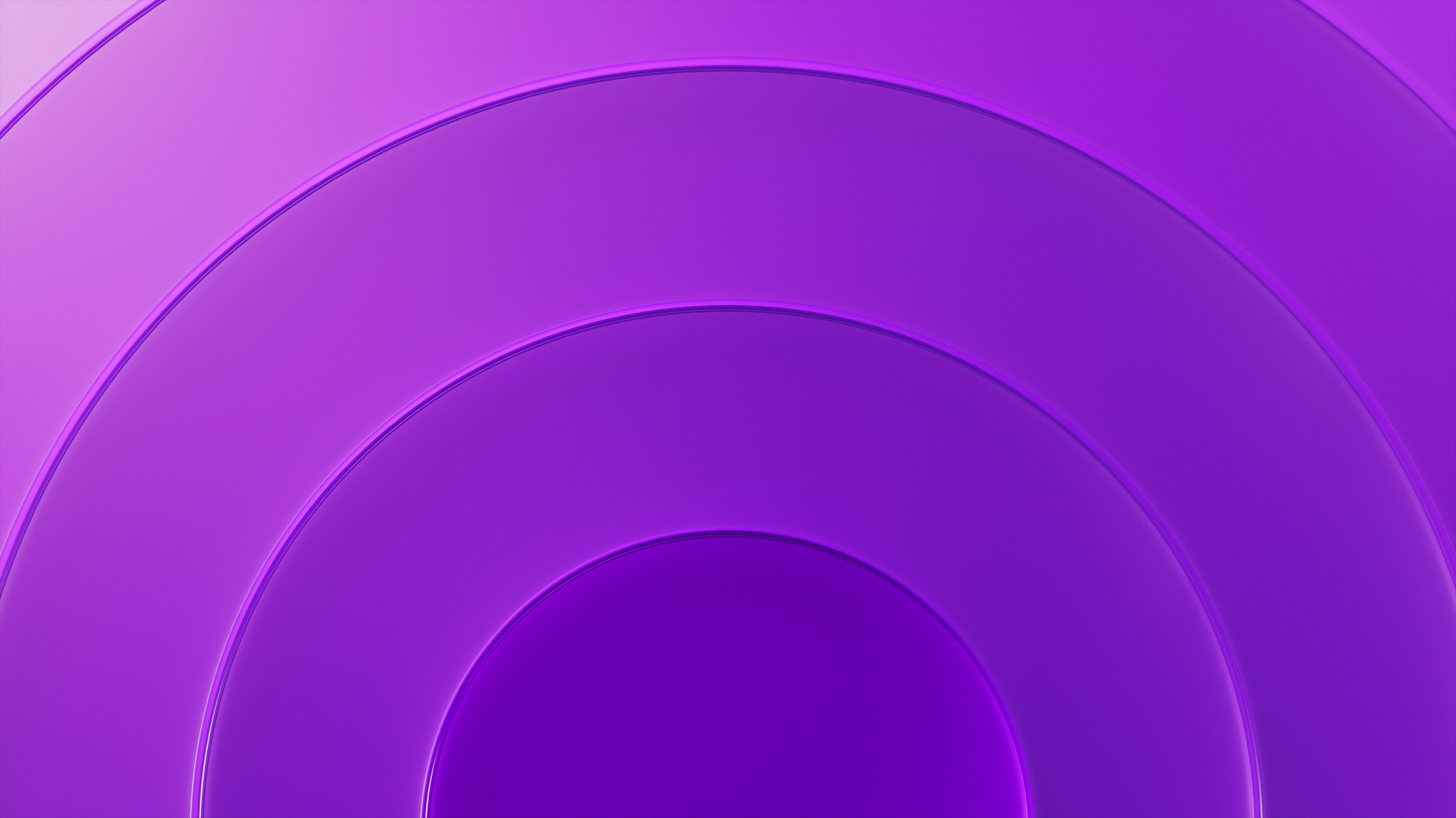 Quatre anneaux ovales en dégradé violet foncé, s’assombrissant à mesure qu’ils s’éloignent de l’anneau central.