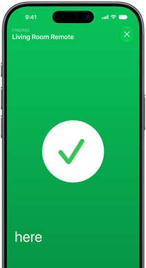 iPhone, Find My app screen, text reads: Finding, Living Room Remote, green background, white circle with green checkmark, text reads: here