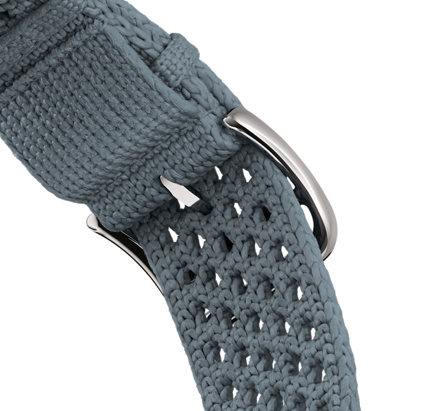 Correa Néo Tricot para el Apple Watch Hermès Series 11, color Bleu Gris (gris azulado), confeccionada con hilo de poliamida tejido, orificios de ajuste en el centro, hebilla y componentes en plata