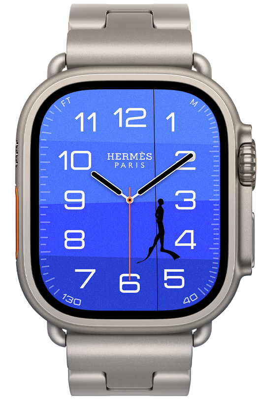 Apple Watch Hermès Ultra 4, Fathom and Wonder analogue watch face (hour, minute and second hands, Depth complication, with an orange buoy floating on top of a turquoise ocean with a gradient from light to dark blue), titanium case, natural colour, right side exterior, Digital Crown, raised side button, paired with Grand H Titane strap, Gris Titane colour