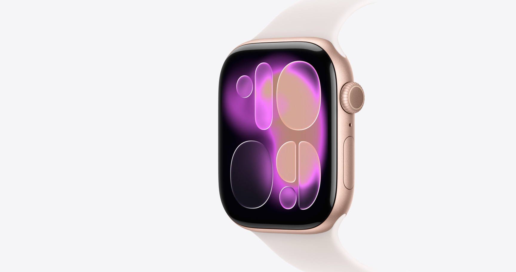 Apple Watch Series 11, rose gold colour, aluminium case, Responsive Art watch face, right side exterior, Digital Crown, microphone, side button, Sport Band, light blush colour