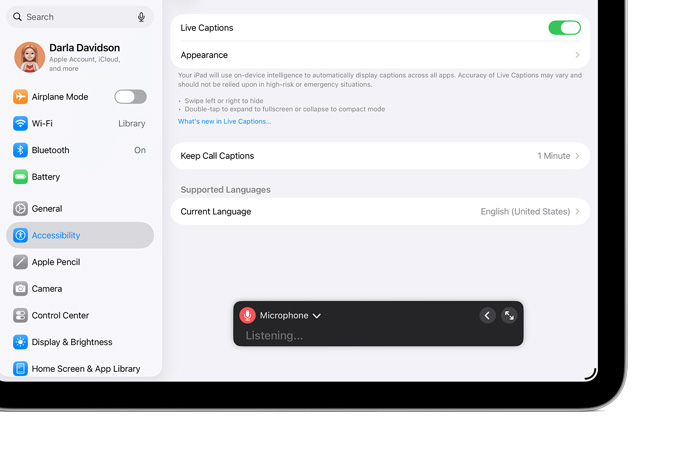iPad displaying variety of Live Captions settings, with microphone listening currently active
