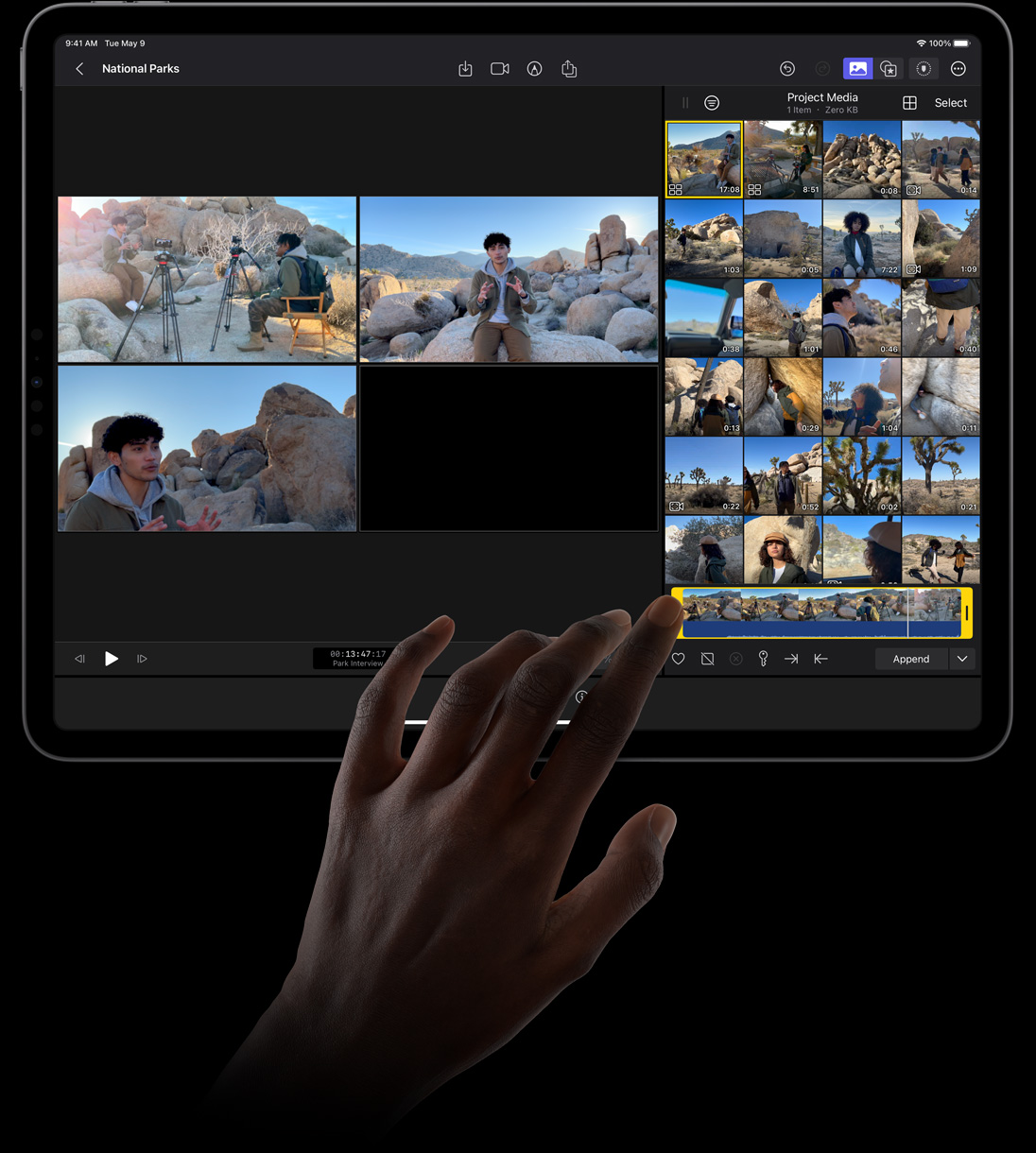 一隻手點按 iPad Pro 顯示器，在 iPad 版 Final Cut Pro 使用 Angle Editor 選取拍攝片段。