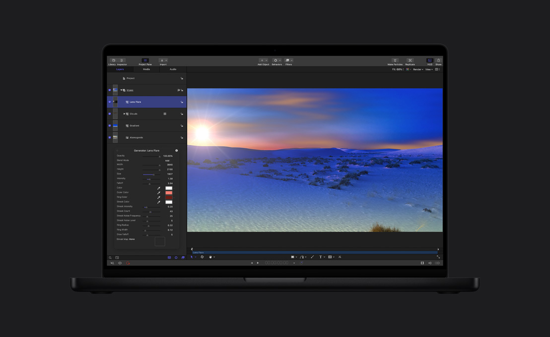 MacBook Pro de 16 polegadas, foto em plano aberto mostrando uma paisagem coberta de neve com um efeito de reflexo de lente