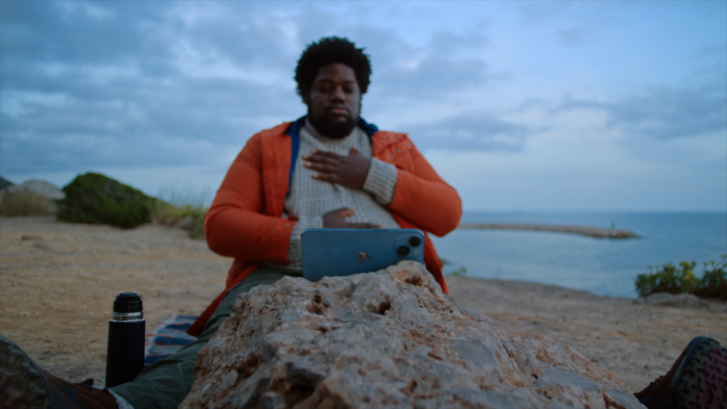 Person doing an Apple Fitness+ meditation workout