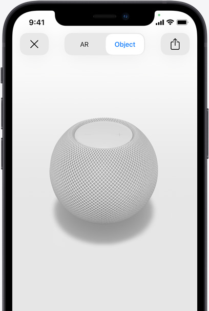 Bílý HomePod na obrazovce iPhone v zobrazení AR.