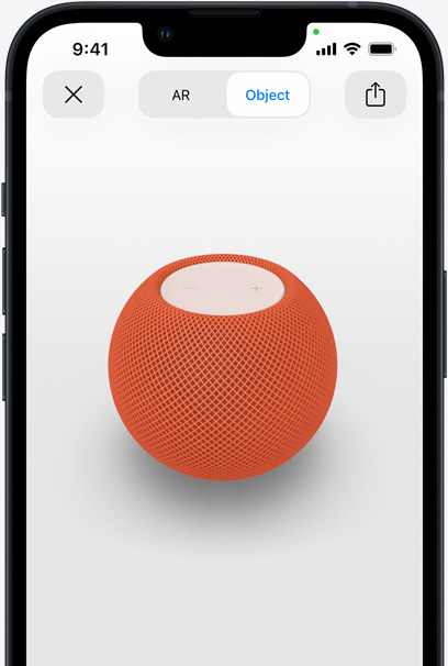 Orange HomePod on the screen of an iPhone in AR view.