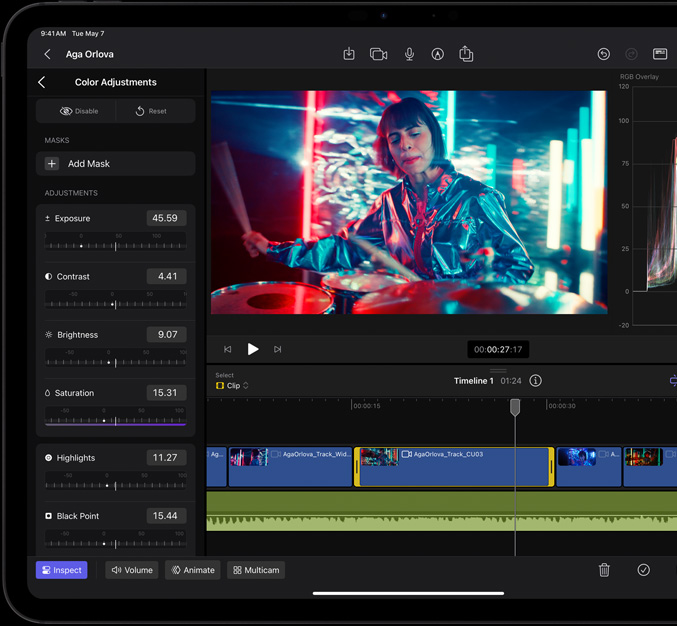 dispunere orizontală, iPad Pro, utilizator editând un videoclip cu o persoană cântând la tobe