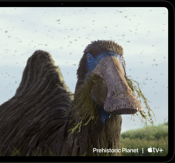хоризонтална ориентация, iPad Pro със сцена от сериала Prehistoric Planet